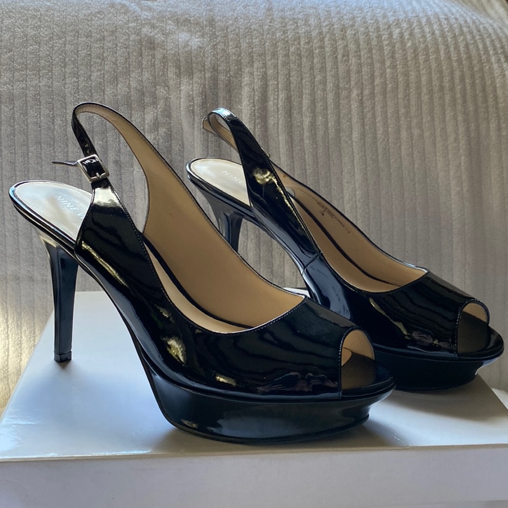 Nine West black patent leather 4” sling back heels.